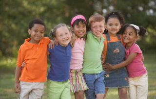 Children in a group hug