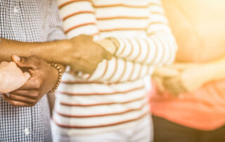Decorative image of people holding hands